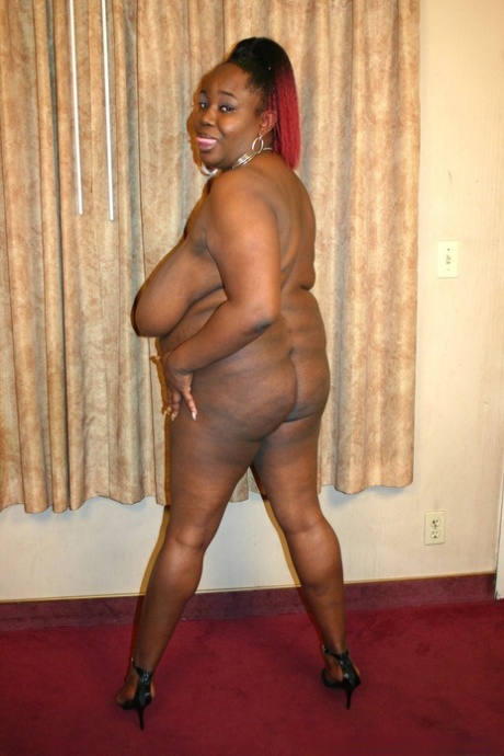 Big black girl takes a cumshot on her big boobs to conclude a fuck 83017720