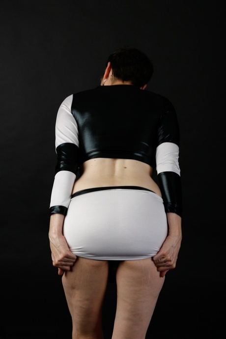 Mature solo woman exposes a breast and her butt cheeks during solo action 44942877
