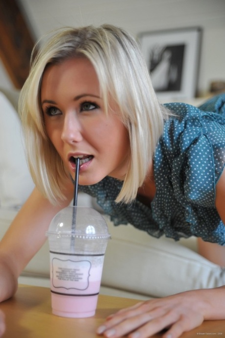Blonde British girl Sam Tye flashes her upskirt panties before going topless 27525465