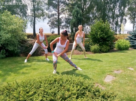 Three girl in workout clothes slip into indoor pool after outdoor aerobics 19790188